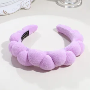 Purple puffy braided sponge headband for face washing and daily hair styling accessories.