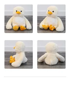 Detalles del suave y tierno peluche de patito amarillo con vistas múltiples y medidas.