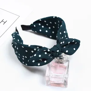 Dark green polka dot bow headband for women, wide vintage hair hoop fashion hair accessory.
