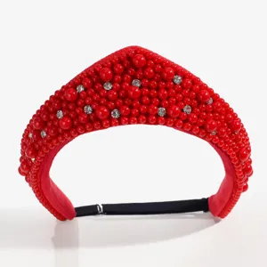 Red pearl rhinestone crown headband detail closeup for elegant retro court style hair accessory.
