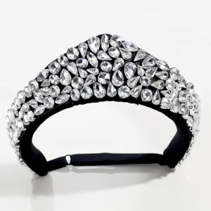 Detailed view of luxury black crystal padded headband, sparkling rhinestones court style hair hoop.