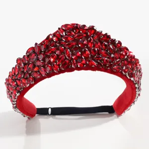 Detail view of the retro red rhinestone crown headband, sparkling crystal hair accessory.