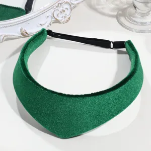 Green velvet hair hoop headband, elegant fabric hair accessory with adjustable black strap.