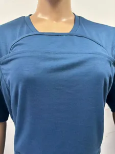Close-up detail showing the front overlay texture of the blue functional nursing top.