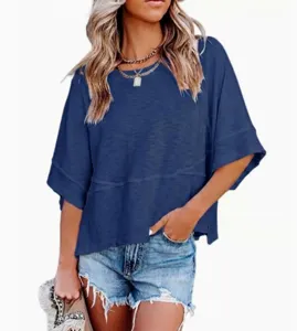 Casual solid color round neck short sleeve loose women t-shirt detail view showing relaxed fit and fabric.
