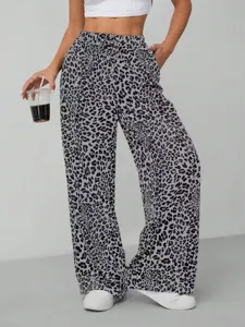 Detail view of women grey leopard print wide leg pants, casual high waist straight trousers.