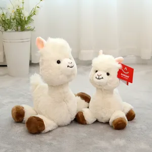 Cute dual plush alpaca dolls detail shot, soft white fluffy texture for cozy home room decor.