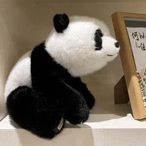 Cute panda plush toy detail view, soft stuffed animal toy for kids, charming sitting panda doll.