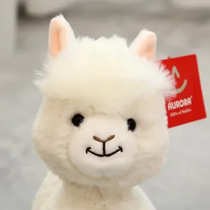 Fluffy white alpaca plush toy detail, soft plush fabric, cute stuffed animal close up view.