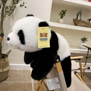 Cute panda plush toy detail view, soft stuffed animal pillow for sleeping and home decor.