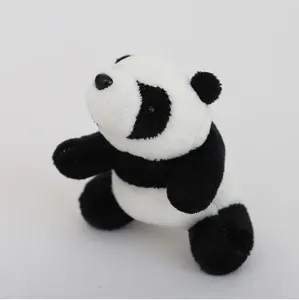 Cute panda plush toy detail close up, soft stuffed animal charm pendant accessory decoration.