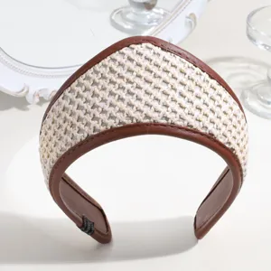 Vintage crown headband with elegant leather trim and woven texture palace style hair hoop.