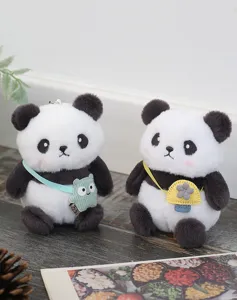 Cute panda plush toy keychain pendant, soft cartoon stuffed doll backpack decoration accessory.
