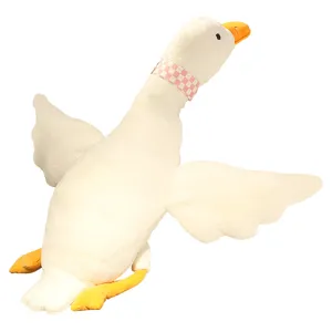 Grande oca bianca peluche, morbido cuscino animale di peluche anatra con sciarpa carina.