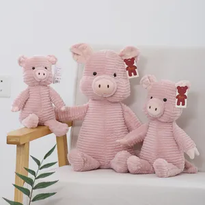 Cute pink corduroy pig plush toy set, soft stuffed animal doll sitting on chair for kids gift.