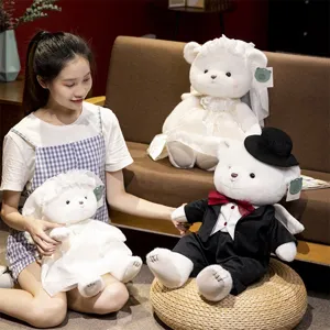 Adorable wedding couple teddy bear plush toys in groom and bride outfits, soft companion gift.