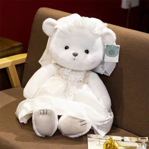 White angel teddy bear plush toy wearing a cute wedding dress and veil for romantic gifts.
