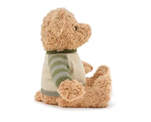Cute curly plush teddy bear wearing a cozy striped knit sweater, perfect toy gift and soft pillow.