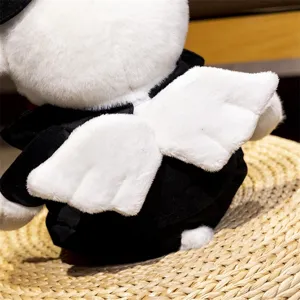 Detailed view of the cute plush bear toy featuring soft black outfit and white angel wings.