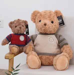 Detailed view of cute retro sweater teddy bear plush toy doll set, soft fluffy stuffed animal.