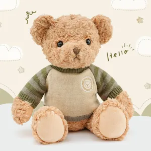 Vintage sweater teddy bear plush toy, soft stuffed doll, cute huggable gift for kids.