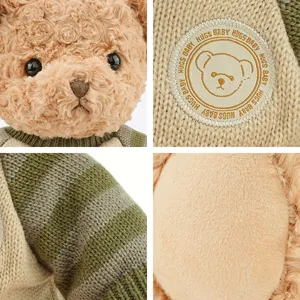 Cute vintage sweater teddy bear plush toy with detailed knit texture and soft doll filling.