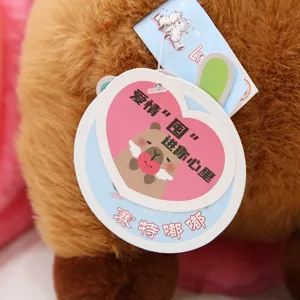 Detailed view of cute capybara plush toy tag, soft stuffed animal gift for girls and kids.