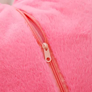 Pink plush toy fabric detail featuring smooth zipper and soft texture for daily comfort.