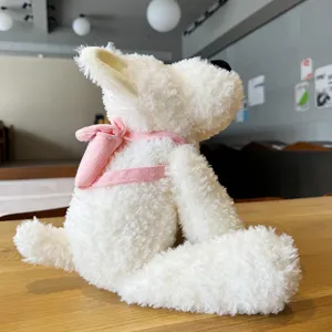 Weißer flauschiger Plüschhund mit süßem rosa Rucksack, weiches Kuscheltier für Kinder und Mädchen.