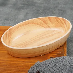 Bol à salade ovale en mélanine imitation bois, vaisselle durable pour cuisine et restaurant.