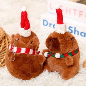 Cute Christmas capybara plush toy keychain, soft stuffed animal bag pendant decoration.