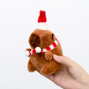 Cute Christmas capybara plush pendant soft doll keychain bag accessory lovely holiday gift decor.