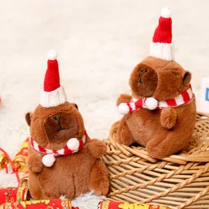 Cute Christmas capybara plush toy pendant with Santa hat and scarf, soft bag decoration.