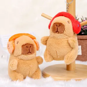 Cute capybara plush toy keychain with headphones, soft stuffed animal bag charm pendant for couples.