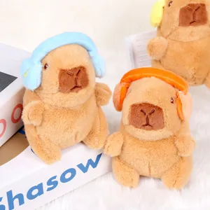 Cute capybara plush toy keychain with colorful headphones, soft stuffed animal bag charm pendant.