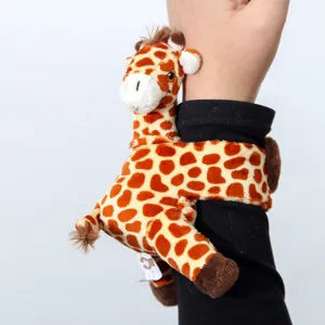 Plush giraffe slap bracelet detail shot, soft fabric and cute animal design for kids.