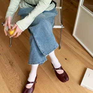 French split-toe flat Mary Jane shoes detail view, soft sole shallow slip-on for women.
