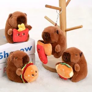 Capybara plush toy keychain featuring cute capybaras holding burgers and fries, soft detail view.