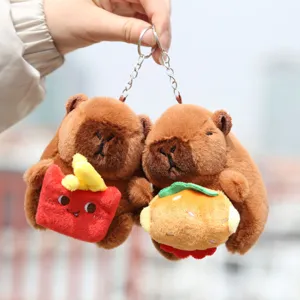 Cute capybara plush keychain holding burger and fries, soft stuffed animal bag charm gift.
