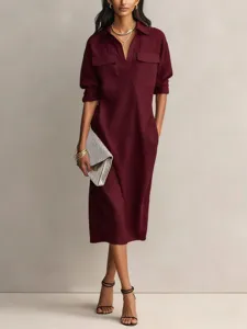 Burgundy button-up midi shirt dress detail, featuring practical chest pockets and elegant collar.