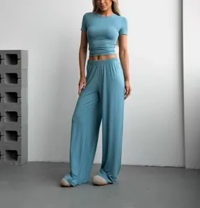 Detail view of the casual two-piece knit set in blue, featuring a short-sleeve top and pants.