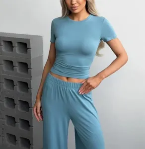 Casual women knit short sleeve t shirt and wide leg trousers two piece set detail view.