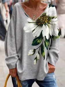 T-shirt à manches longues et col V décontracté avec grand imprimé floral élégant.