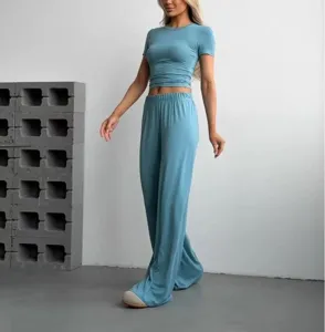Detailed shot of the blue knit two-piece outfit showcasing fabric texture and fit.