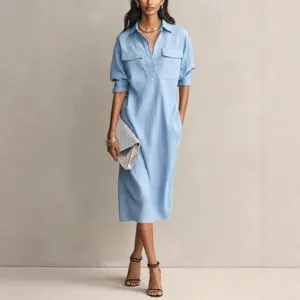 Light blue cotton linen shirt dress with button-down front and dual pockets for women.