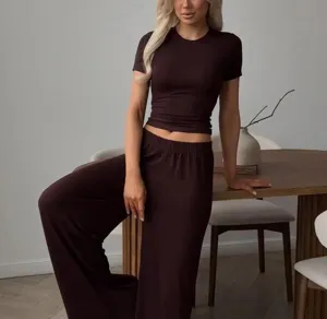 Knit short sleeve t-shirt and wide leg pants two piece set in dark brown detail view.