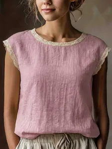 Detailed view of a vintage solid color linen blouse with delicate lace trim sleeveless top.