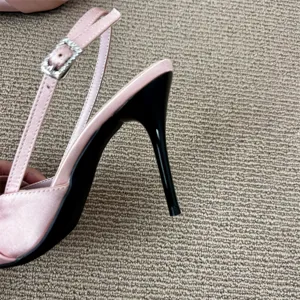 Pink satin stiletto high heels with rhinestone buckle, elegant slingback sandals for women.