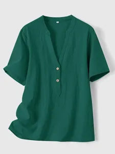 Detail view of the dark green casual v-neck short sleeve shirt, highlighting fabric and buttons.