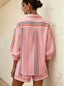 Back view of women pink striped button-up shirt and shorts set, detail of pleated back and sleeves.